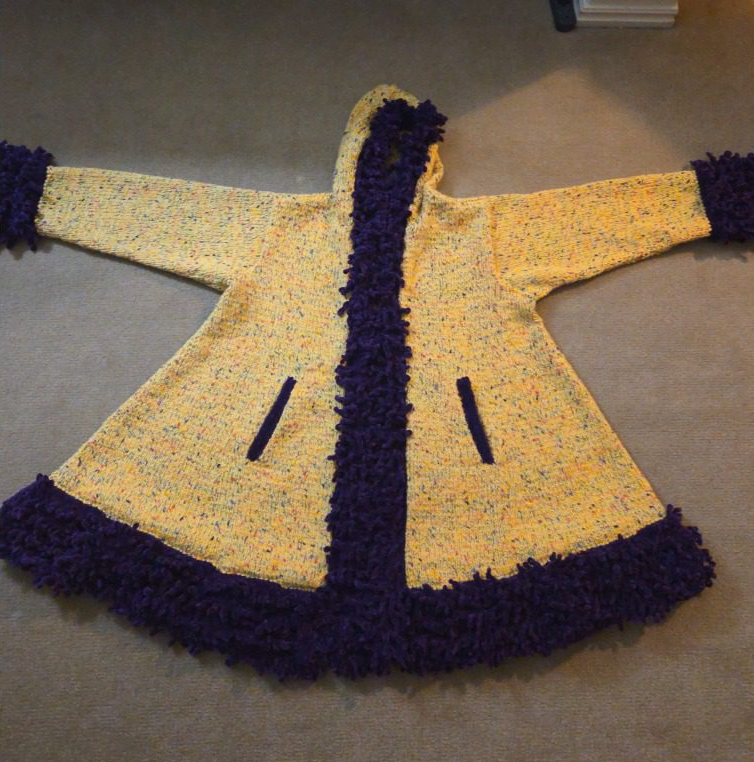 Yellow knit coat with purple fuzzy trim